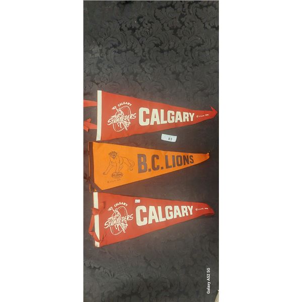 3 vintage pennants, Calgary x 2 and BC Lions