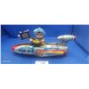 Image 1 : Large 1960s tin toy rocket ship with boy holding camera