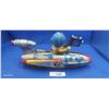 Image 2 : Large 1960s tin toy rocket ship with boy holding camera