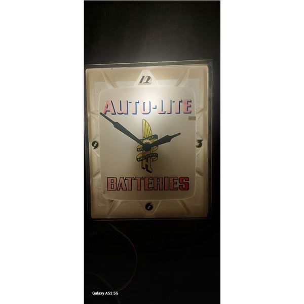 Vintage Autolite Batteries light up clock, tested, some damage 21" x 18"