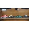 Image 2 : 13 die cast trucks on wooden rack, each truck approx 5"