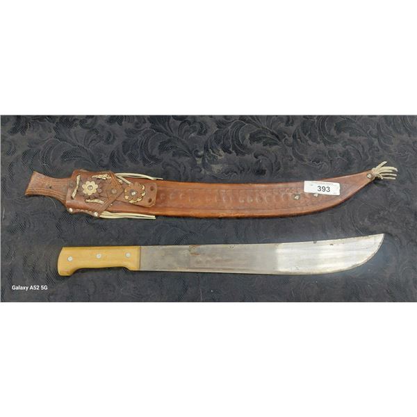 Vintage machete with ornately decorated leather sheath 24"