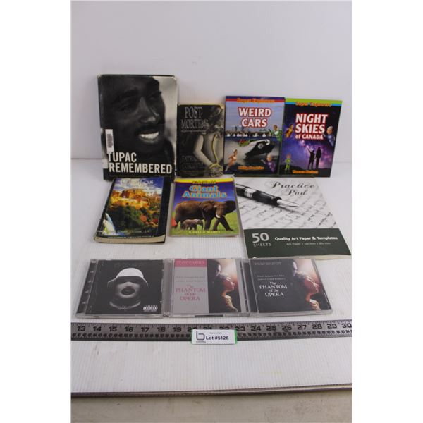 (7) Books (Tupac, Cuentos Para Dormir, Kids World), (3) Musical CDs (Phantom of the Opera, Oxymoron)