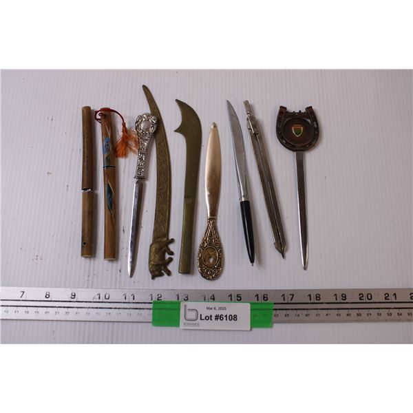 Assorted Letter Openers and a Compass