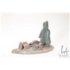 Image 1 : Inuit soapstone carving of a camp including occupant, firepit, seal, catch on the day etc. No artist