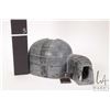 Image 8 : Inuit soapstone carving of an igloo with occupants including three human figures, on decapitated, se