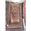 Image 1 : Wool are carpet with triple medallion, terracotta background and highlights of blue, orange, taupe e