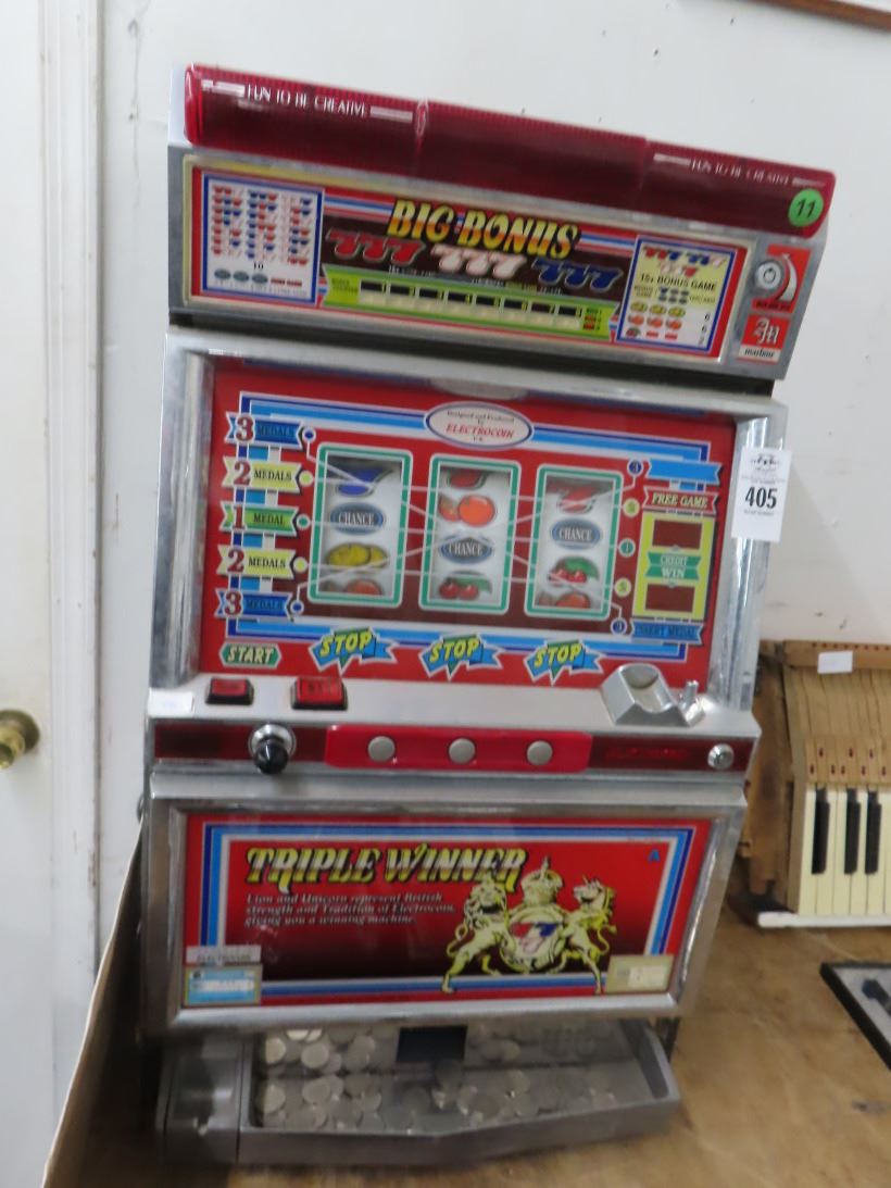 Triple Winner Token Slot Machine