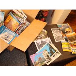 Large box filled with postcards