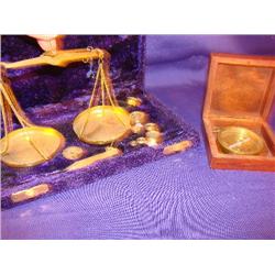 Small brass scale in purple velvet case & compass