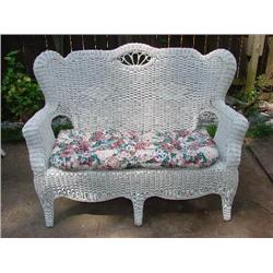 White Wicker Loveseat w/floral cushion