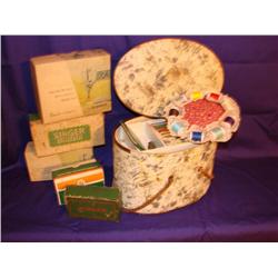 Sewing items, including basket.