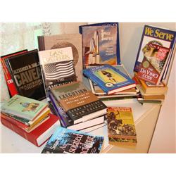 2 boxes of assorted themed books