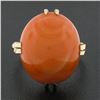 Image 2 : Vintage 18K Gold Cabochon Pinkish-Orange Natural Coral Open Work Solitaire Ring