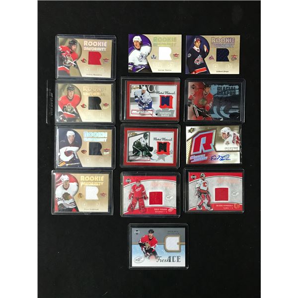 LOT OF 13 ASSORTED FLEER ROOKIE UNIFORMITY HOCKEY CARDS