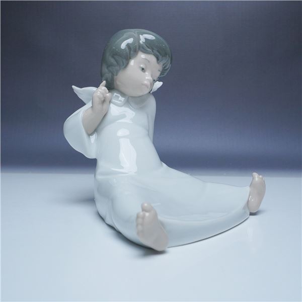 Lladro Porcelain Figurine, Wondering Cherub 01004962