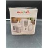 Image 2 : Munchkin Fast Bottle Warmer with Measuring Cup and Adapter Ring