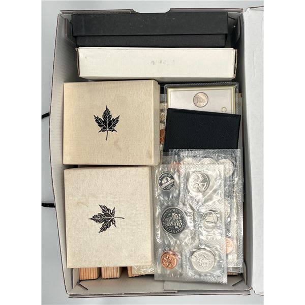 Royal Canadian Mint - Shoebox full of sets and dollars