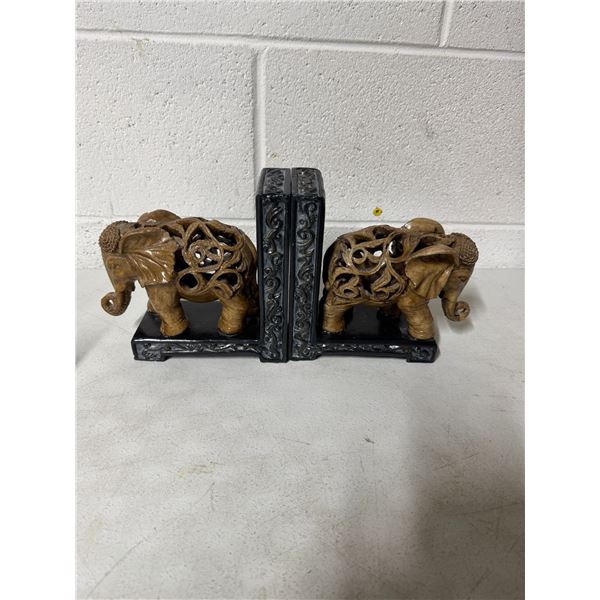 Elephant book ends one has damaged the picture