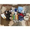 Image 1 : Box of random kitchen items. Plates, mugs, napkin rings, table cloth, travel mugs.