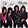 Image 1 : Kiss signed Lick It Up album