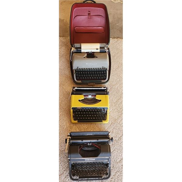 3 Vintage Typewriters in cases