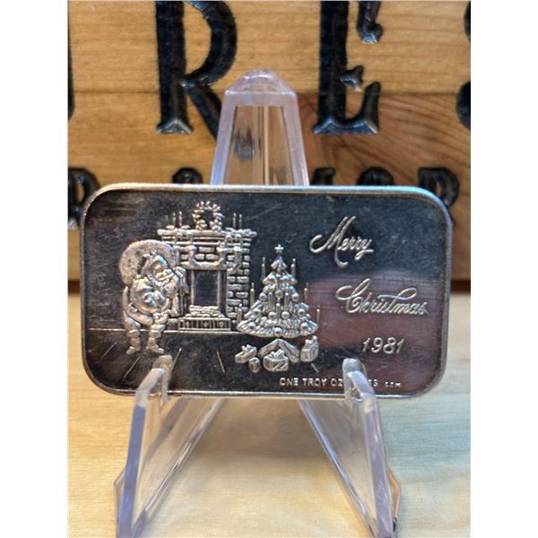 Lot 24-1) 1 oz Merry Christmas 1981 Silver bar