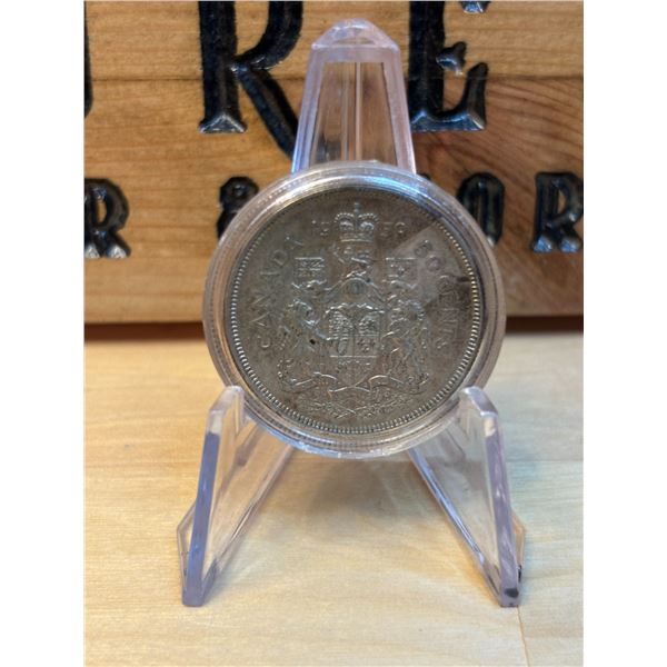 Lot 28-1) 50c Canadian coin 1959