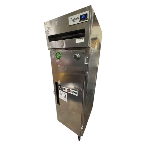 DELFIELD 6000XL MODEL 6025XL-S COMMERCIAL REFRIGIRATOR WITH CASTORS TESTED WORKING. CONTENTS NOT INC