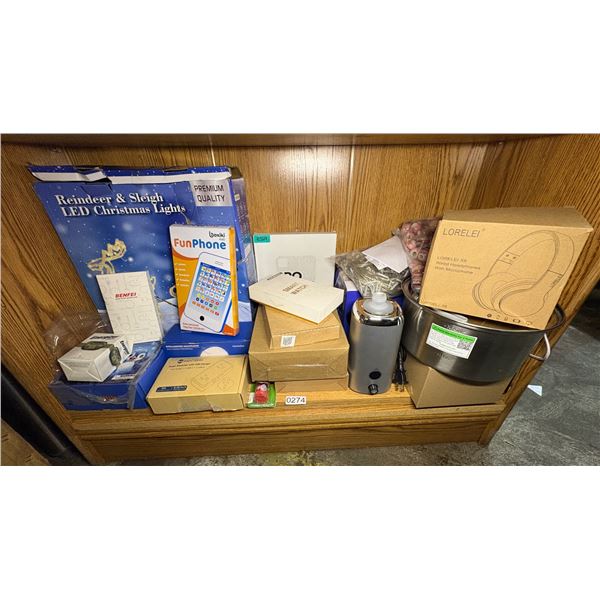 SHEF LOT OF SOATED ELECTRONICS -  ENERGIZER LIGHTS, SMART WATCH, HEAD PHONES, SURGE PROTECTOR WITH U