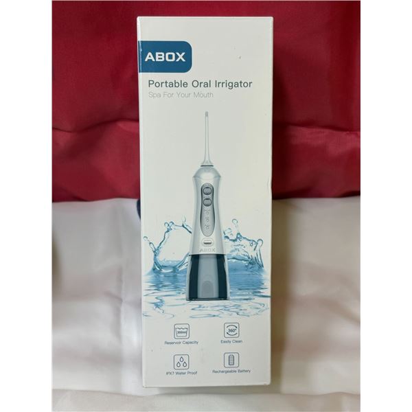PORTABLE ORAL IRRIGATOR