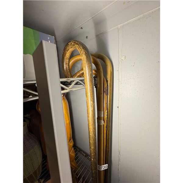 Group of 4 small wooden sticks approx. 28IN tall