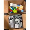 Image 1 : 2 boxes with assorted standard queen pillow shamps & assorted building block toys