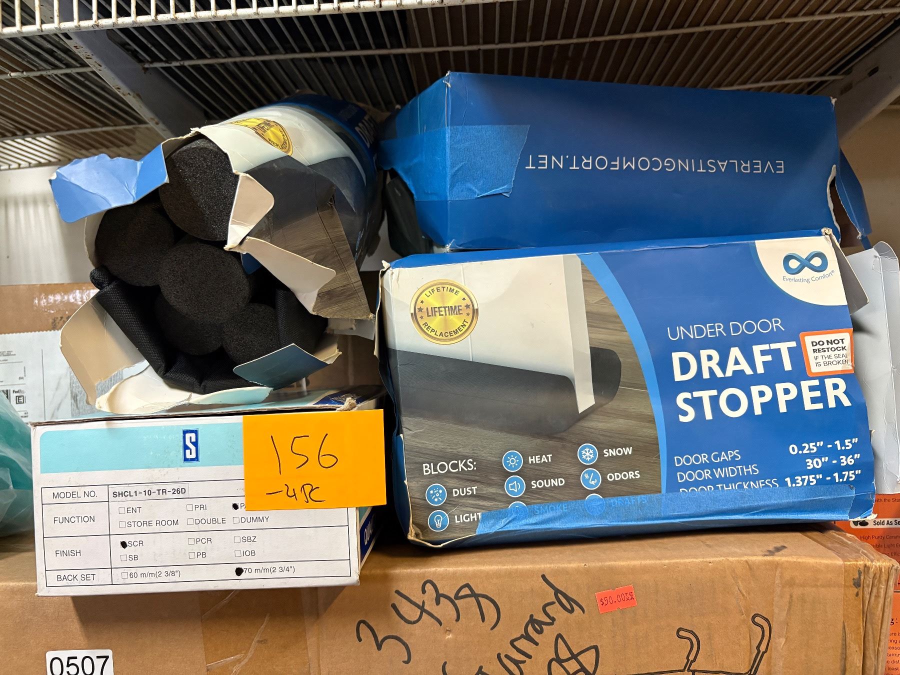 Draft Lock Group of underdoor draft stoppers & door lock