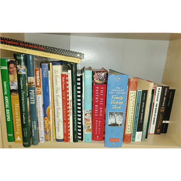 Two Shelves Of Assorted Books