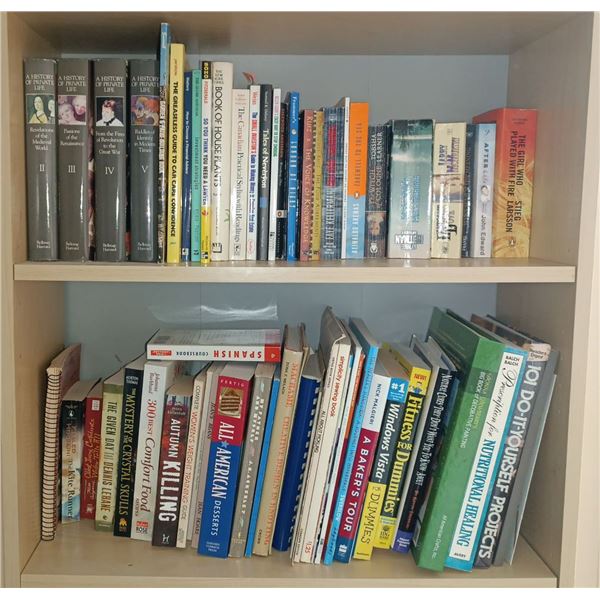 Two Shelves Of Assorted Books