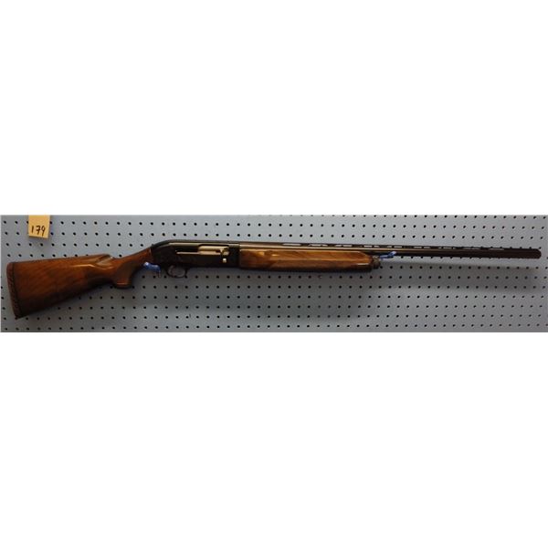 P. Beretta Model. A-M-301, Semi automatic 12 gauge Magnum shotgun, vent rib,  serial number B56868E.