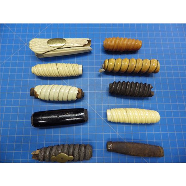 10 dagger grips from various military type daggers with varying amounts of damage