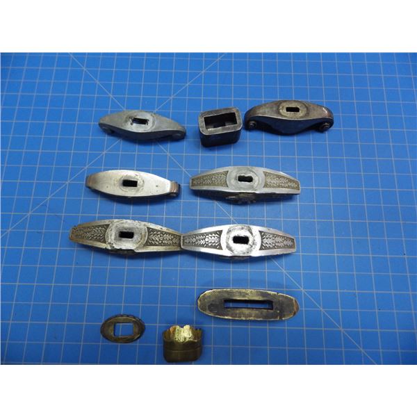 10 crossguards, mostly from WW II German daggers with swastikas broken off