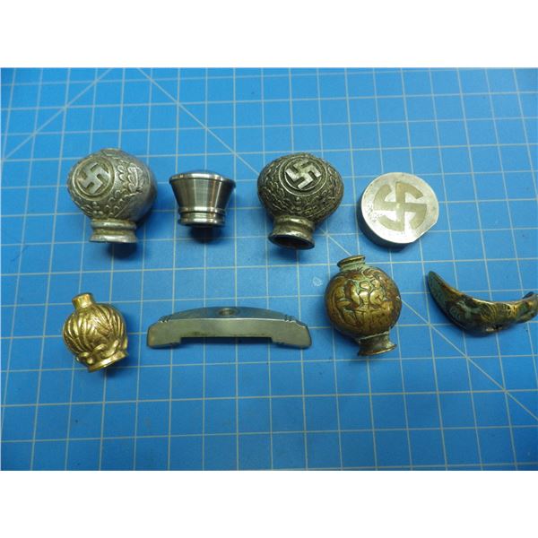 8 pommels, most from military daggers