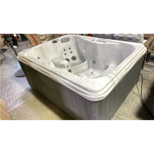 ARTESIAN SPAS MODEL GARDEN SPAS IRIS. 78"X60"X30". 110V. SILVER MARBLE/GREY CABINET. SEATS 4