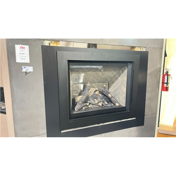 VALOR RADIANT H6 SERIES GAS FIREPLACE. HERRINGBONE LINER, TRADITIONAL LOGS AND 4 SIDED TRIM IN