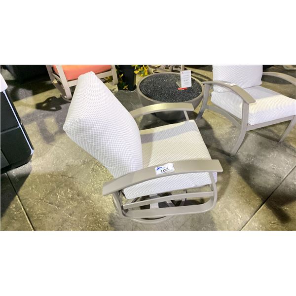 TELESCOPE CASUAL BELLE ISLE CUSHION SWIVEL ROCKER WITH DETAIL LINEN FABRIC AND STORM FRAME. MARINE
