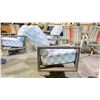 Image 4 : TELESCOPE CASUAL LARSSEN CUSHION SWIVEL ROCKER. BEACHWOOD COLOR FRAME AND DREAM MIST FABRIC.