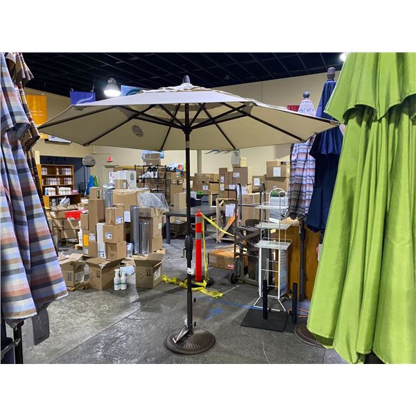 TREASURE GARDEN 9' OCTAGONAL UMBRELLA WITH AUTO TILT AND WEIGHTED BASE. BRONZE FRAME/KHAKI FABRIC