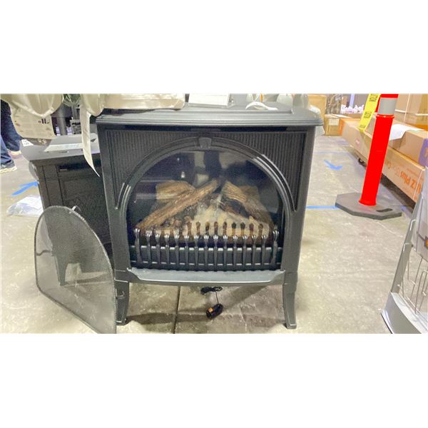 VALOR GAS FIREPLACE. MADRONA CAST STOVE AS SHOWN WITH BLACK CAST, ARCHED FRONT AND TRADITIONAL LOG