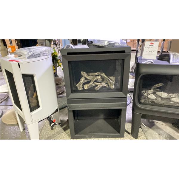 JOTUL GF 520 DV IPI CAST IRON GAS STOVE AS SHOWN IN MATTE BLACK AND BEACH LOG SET. HEATS UP TO