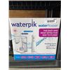Image 1 : Waterpik Water Flosser Ultra Plus Cordless Pearl