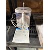 Image 1 : Waterpik Countertop Water Flosser Model WP-660C With Quick Start Guide