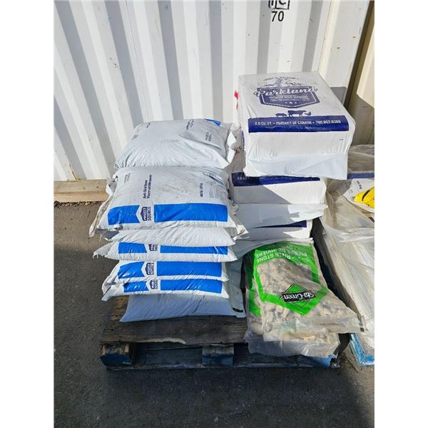 Pallet Lot of Mixed Bulk Materials Including Anti-Skid Stone, River Stone, and Wood Shavings